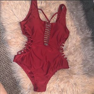 Dark red one piece swimsuit with cut outs NWT